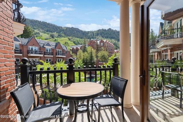 balcony featuring a mountain view