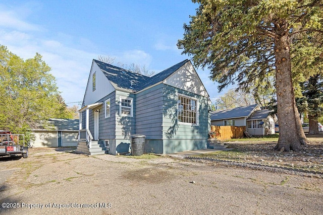 828 Taylor St, Craig, CO 81625 - view of front of property featuring a shingled roof