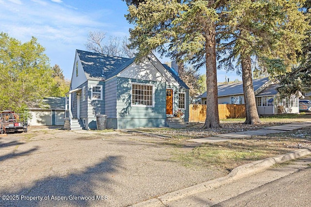 828 Taylor St, Craig, CO 81625 - view of front of house with a chimney and entry steps