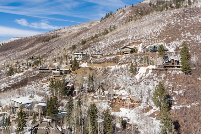 0184 Mountain Laurel Dr, Aspen, CO 81611 - snowy aerial view with a mountain view
