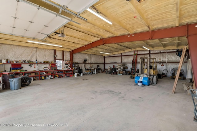 400 Behrman St, Craig, CO 81625 - garage with a workshop area and a garage door opener
