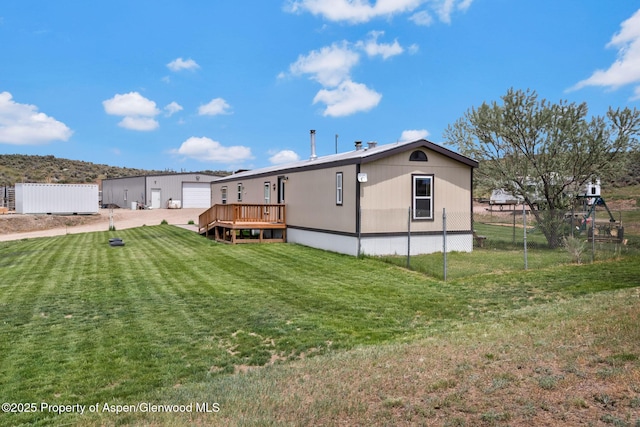 400 Behrman St, Craig, CO 81625 - rear view of house featuring driveway and a detached garage