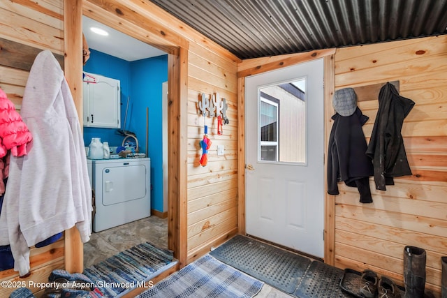400 Behrman St, Craig, CO 81625 - entrance foyer featuring washer / dryer and wooden walls