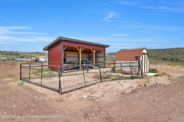 400 Behrman St, Craig, CO 81625 - view of outbuilding featuring a detached carport and an exterior structure