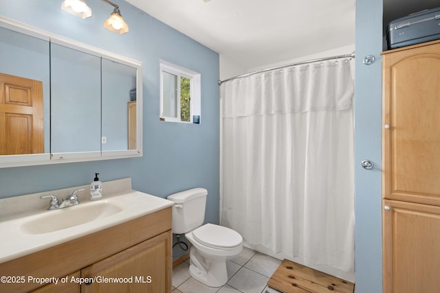 1026 Palmer Ave, Glenwood Springs, CO 81601 - bathroom with vanity, tile patterned flooring, and curtained shower