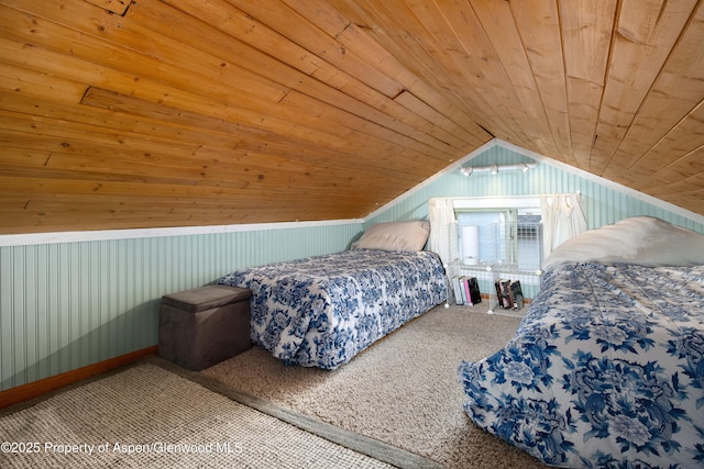 1026 Palmer Ave, Glenwood Springs, CO 81601 - bedroom with wooden ceiling, carpet flooring, lofted ceiling, and wood walls