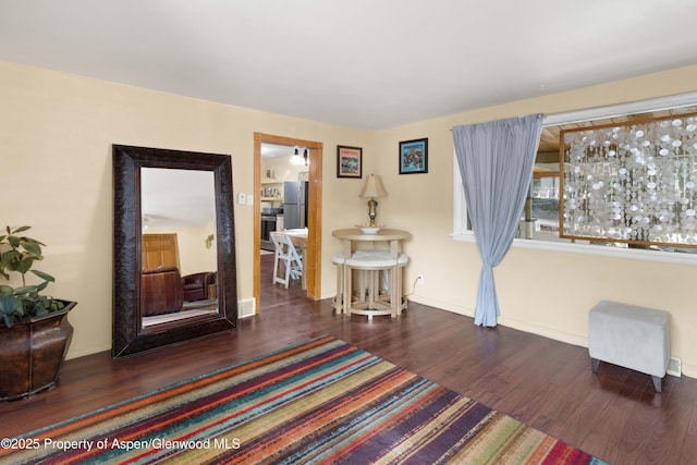 1026 Palmer Ave, Glenwood Springs, CO 81601 - sitting room with wood finished floors and baseboards