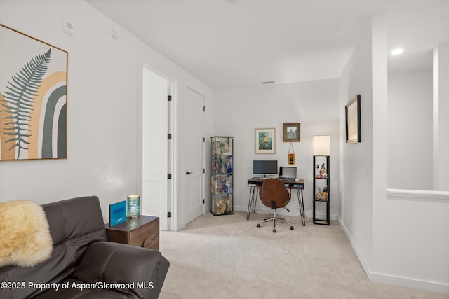 office with carpet flooring and baseboards