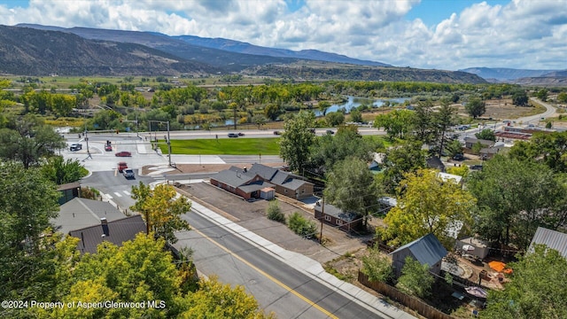 drone / aerial view featuring a mountain view