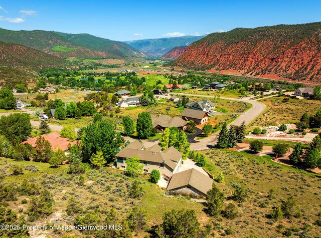 263 Dolores Cir, Glenwood Springs, CO 81601 - aerial perspective of suburban area with a mountainous background