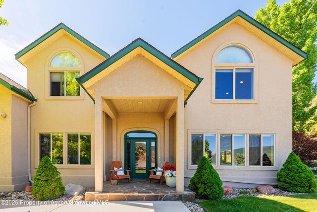 263 Dolores Cir, Glenwood Springs, CO 81601 - view of exterior entry featuring stucco siding
