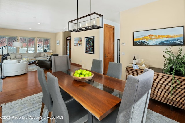 dining room featuring recessed lighting and wood finished floors