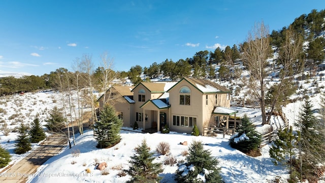 traditional-style home with stucco siding