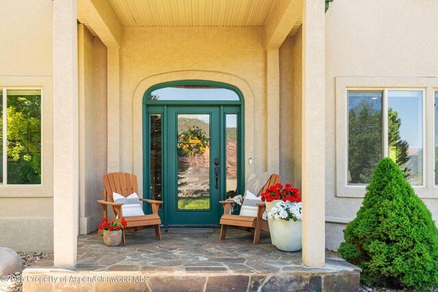 263 Dolores Cir, Glenwood Springs, CO 81601 - doorway to property with stucco siding