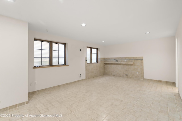 empty room with recessed lighting