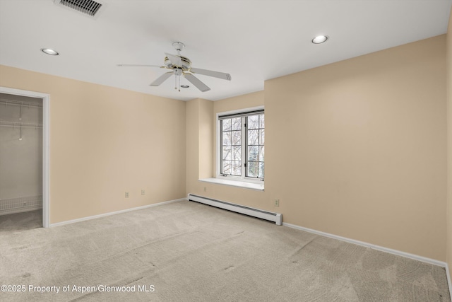 unfurnished bedroom featuring visible vents, recessed lighting, carpet floors, baseboards, and baseboard heating