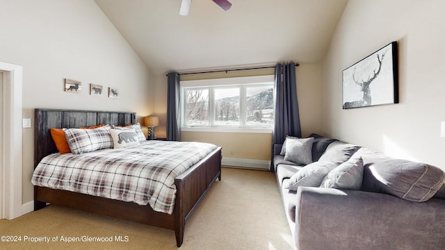 bedroom with vaulted ceiling, ceiling fan, light carpet, and baseboards