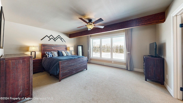 bedroom featuring light carpet, a ceiling fan, beam ceiling, and baseboards