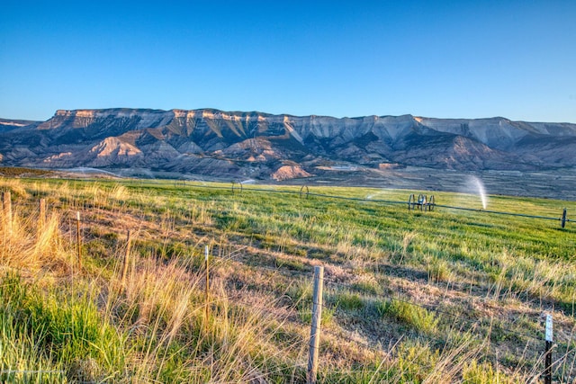 view of mountain feature with a rural view