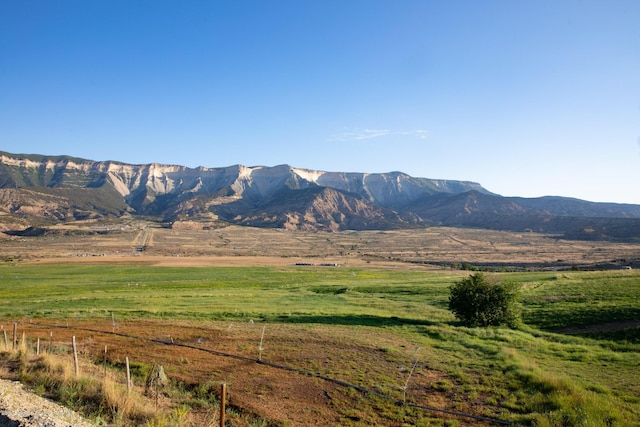 mountain view featuring a rural view