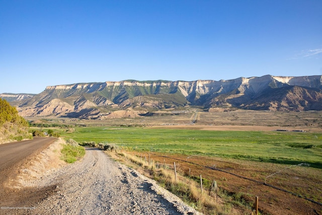 property view of mountains featuring a rural view