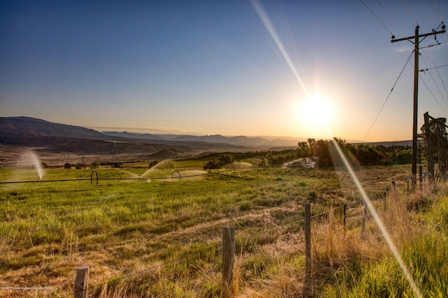 view of mountain feature with a rural view