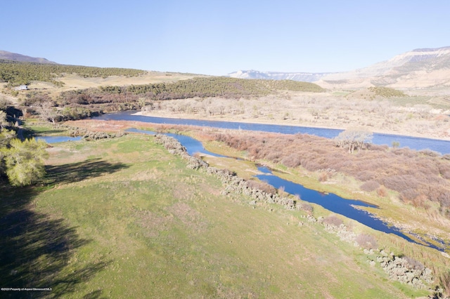 aerial view with a water and mountain view