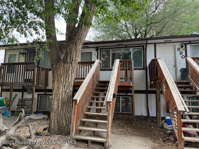 872 Russell St, Craig, CO 81625 - view of jungle gym featuring stairway and a deck