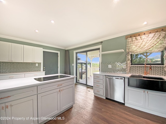 kitchen featuring white cabinetry, sink, stainless steel dishwasher, and electric stovetop