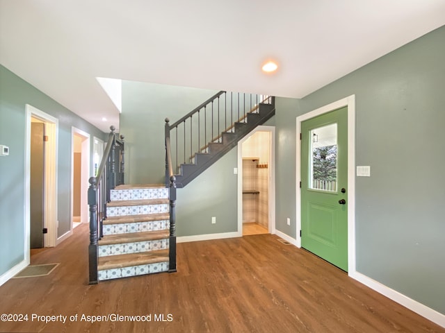 foyer featuring hardwood / wood-style floors