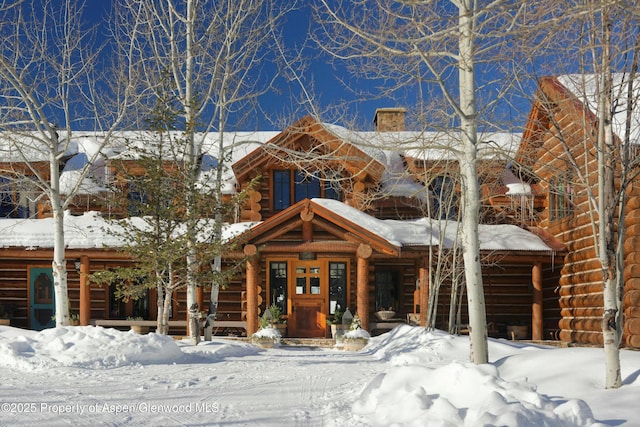 view of log-style house