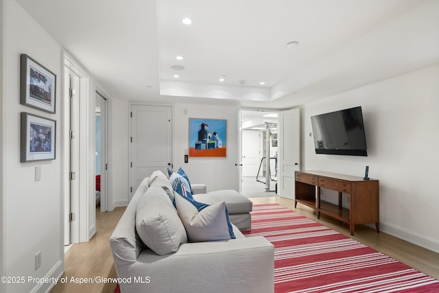 10 Ute Pl, Aspen, CO 81611 - living room with light wood-style floors, recessed lighting, and a tray ceiling