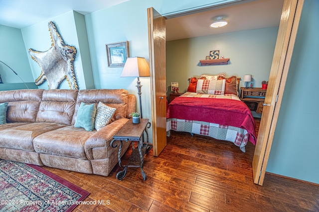 bedroom featuring hardwood / wood-style flooring