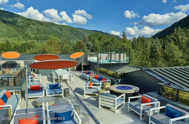 550 S Spring St Unit F8-10, Aspen, CO 81611 - balcony featuring a forest view and a mountain view