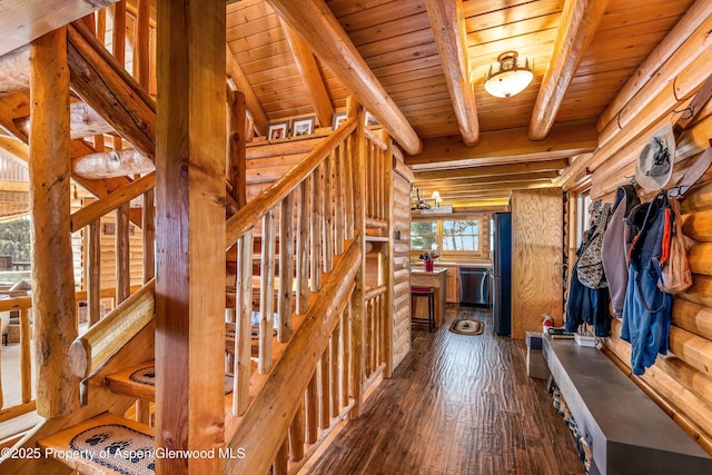 3 Hazel Lake Dr, Cimarron, CO 81220 - stairs featuring log walls, wood ceiling with exposed beams, and wood-type flooring