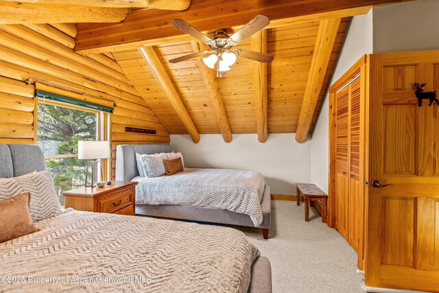 3 Hazel Lake Dr, Cimarron, CO 81220 - bedroom featuring wooden ceiling, light carpet, a closet, log walls, and baseboards