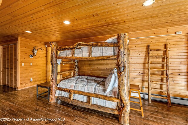 3 Hazel Lake Dr, Cimarron, CO 81220 - unfurnished bedroom featuring wood walls, wood ceiling, wood finished floors, and recessed lighting