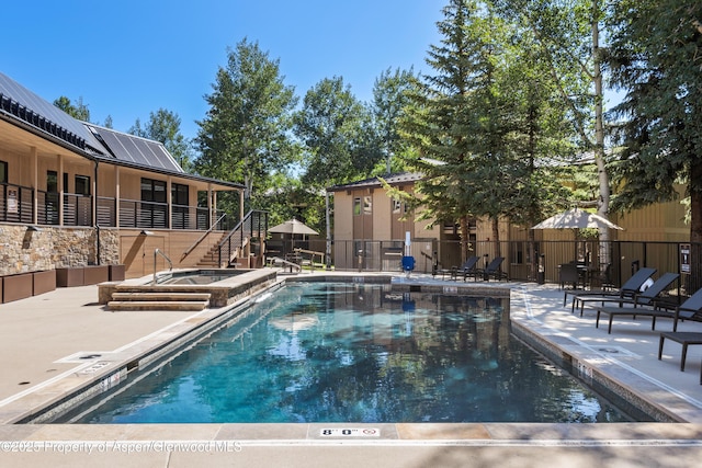 35 Upper Woodbridge Rd Unit 34Cd, Snowmass Village, CO 81615 - community pool featuring a patio, a community hot tub, and stairs