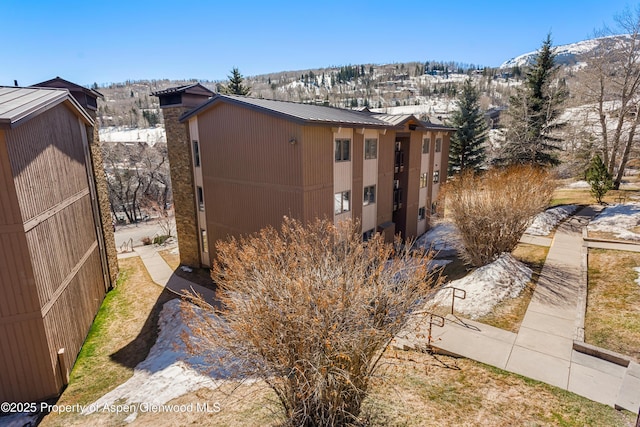 35 Upper Woodbridge Rd Unit 34Cd, Snowmass Village, CO 81615 - view of outdoor structure with a mountain view