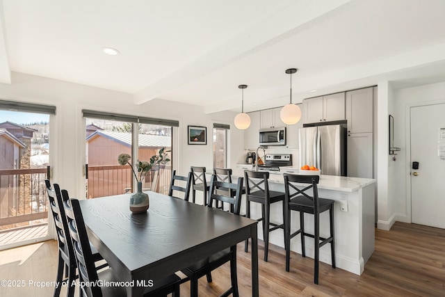 35 Upper Woodbridge Rd Unit 34Cd, Snowmass Village, CO 81615 - dining space featuring light wood-style floors, beam ceiling, and recessed lighting