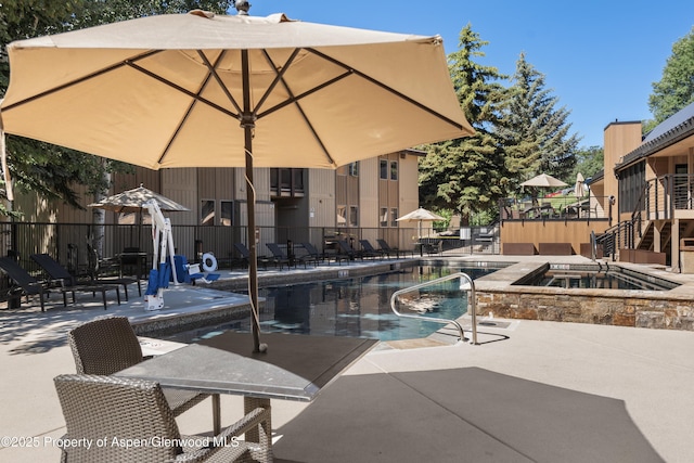 35 Upper Woodbridge Rd Unit 34Cd, Snowmass Village, CO 81615 - view of patio with a community pool, a hot tub, and stairway
