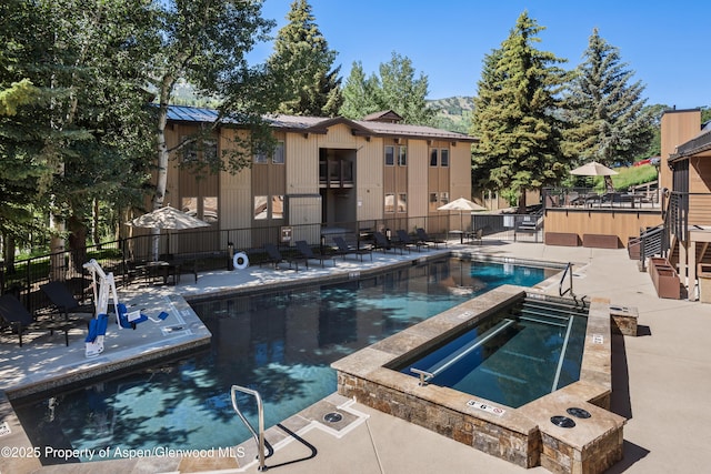 35 Upper Woodbridge Rd Unit 34Cd, Snowmass Village, CO 81615 - community pool with a community hot tub and a patio area
