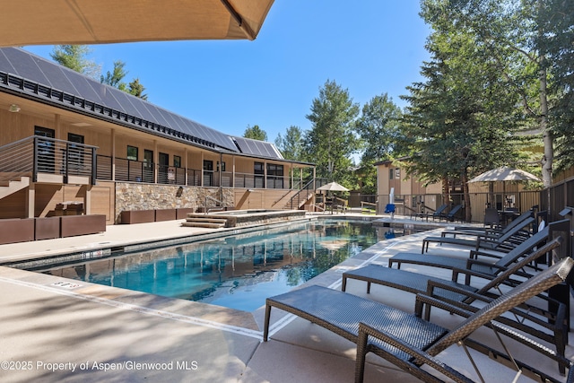 35 Upper Woodbridge Rd Unit 34Cd, Snowmass Village, CO 81615 - community pool featuring a patio area and stairs