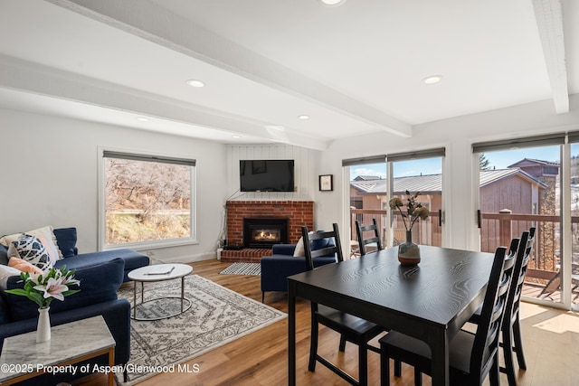 35 Upper Woodbridge Rd Unit 34Cd, Snowmass Village, CO 81615 - dining area with beamed ceiling, a fireplace, light wood-type flooring, and recessed lighting