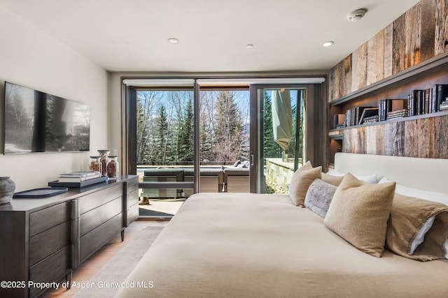 62 Bennett Ct, Aspen, CO 81611 - bedroom featuring access to outside, multiple windows, light wood-style flooring, and recessed lighting