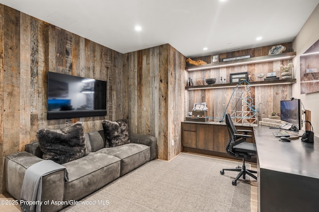 62 Bennett Ct, Aspen, CO 81611 - office space featuring wooden walls, carpet, built in desk, and recessed lighting