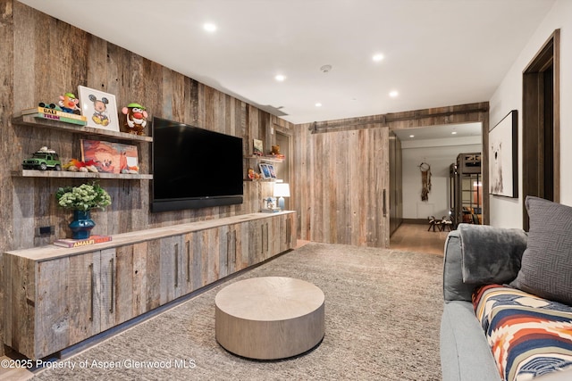 62 Bennett Ct, Aspen, CO 81611 - living area with wood walls and recessed lighting