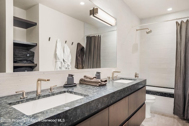 62 Bennett Ct, Aspen, CO 81611 - bathroom with tiled shower / bath, toilet, double vanity, and recessed lighting