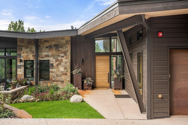 62 Bennett Ct, Aspen, CO 81611 - doorway to property with stone siding
