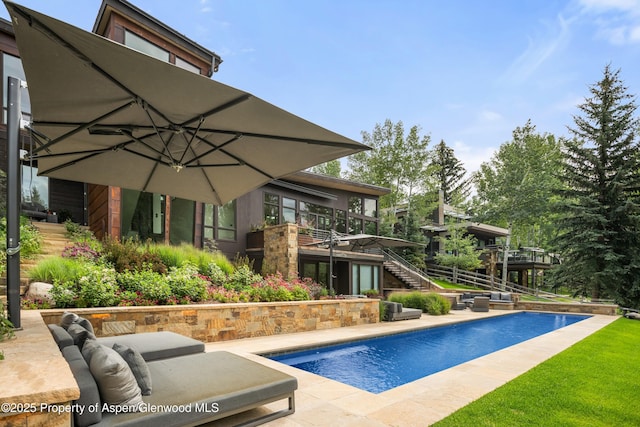 62 Bennett Ct, Aspen, CO 81611 - swimming pool with stairway and a wooden deck